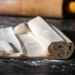 Fresh Filo Pastry in 500 gram packet on a white background